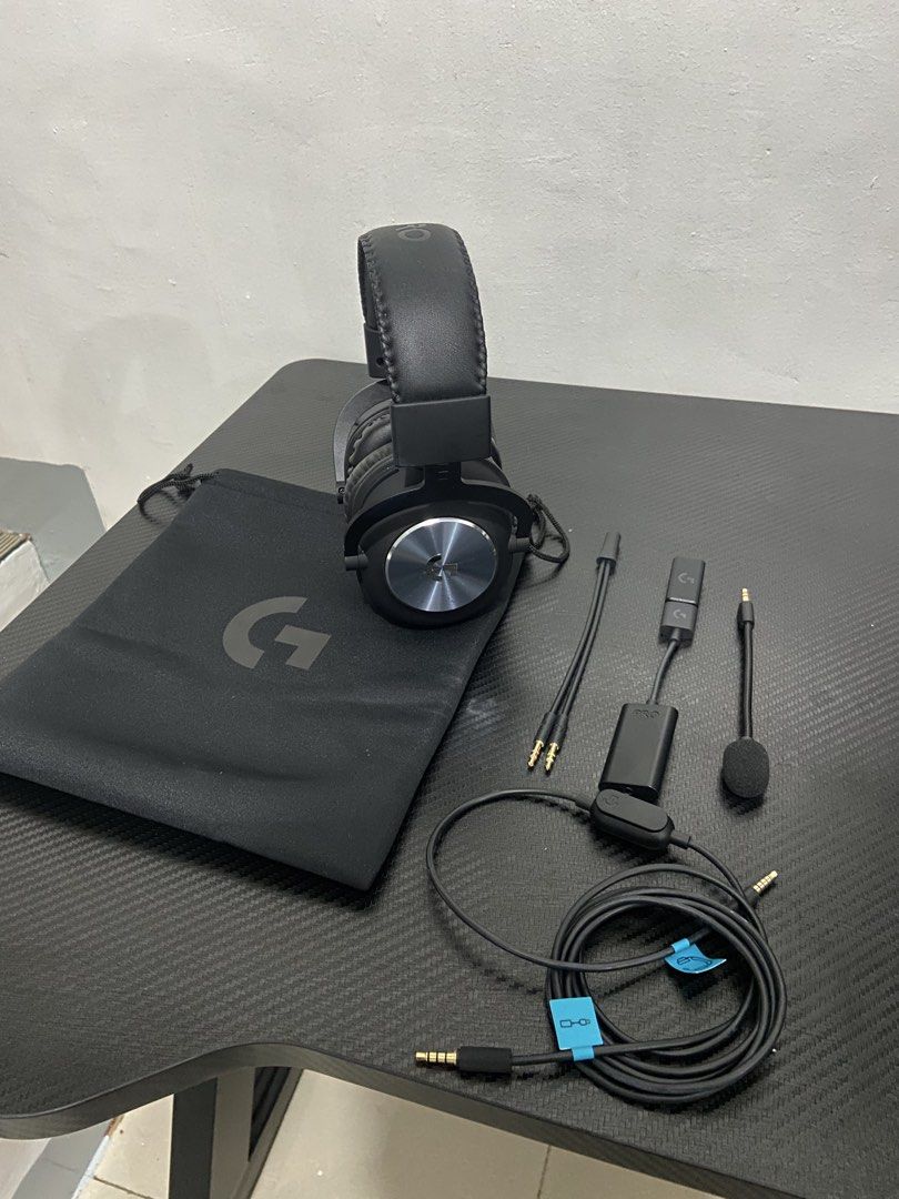 Logitech G Pro Gaming Headset with Accessories (Category: Headphones & Headsets) located in Makati City. Submitted by mightybear_3ac45c (Listing ID 1467133341, Image 2). Description: - Authentic Logitech G Pro gaming headset in sleek black with metal accents - Fully functional setup, perfect for immersive gaming and crystal-clear voice calls - Includes detachable boom mic, USB DAC adapter, and audio cable with in-line controls - Comes with PC spl