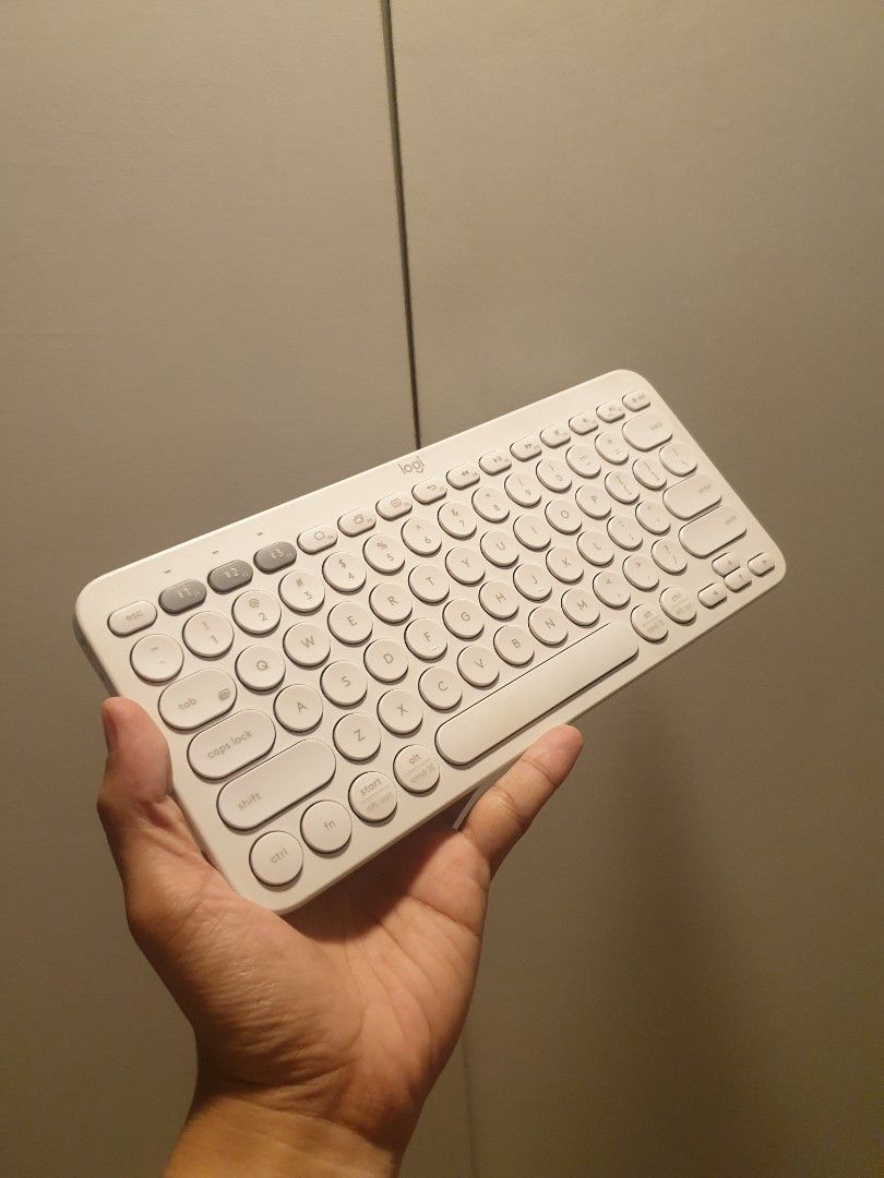Logitech K380 Multi-Device Bluetooth Keyboard Off-White (Category: Computer Keyboard) located in Manila. Submitted by lesterjohn17980 (Listing ID 1467003484, Image 2). Description: - Model: Logitech K380 Wireless Bluetooth Keyboard - Color: Clean white with stylish round keycaps - Multi-Device: Seamlessly switch between phones, tablets, and laptops using the 3 grey easy-switch keys - Portable: Slim and lightweight design, ideal for travel and mob