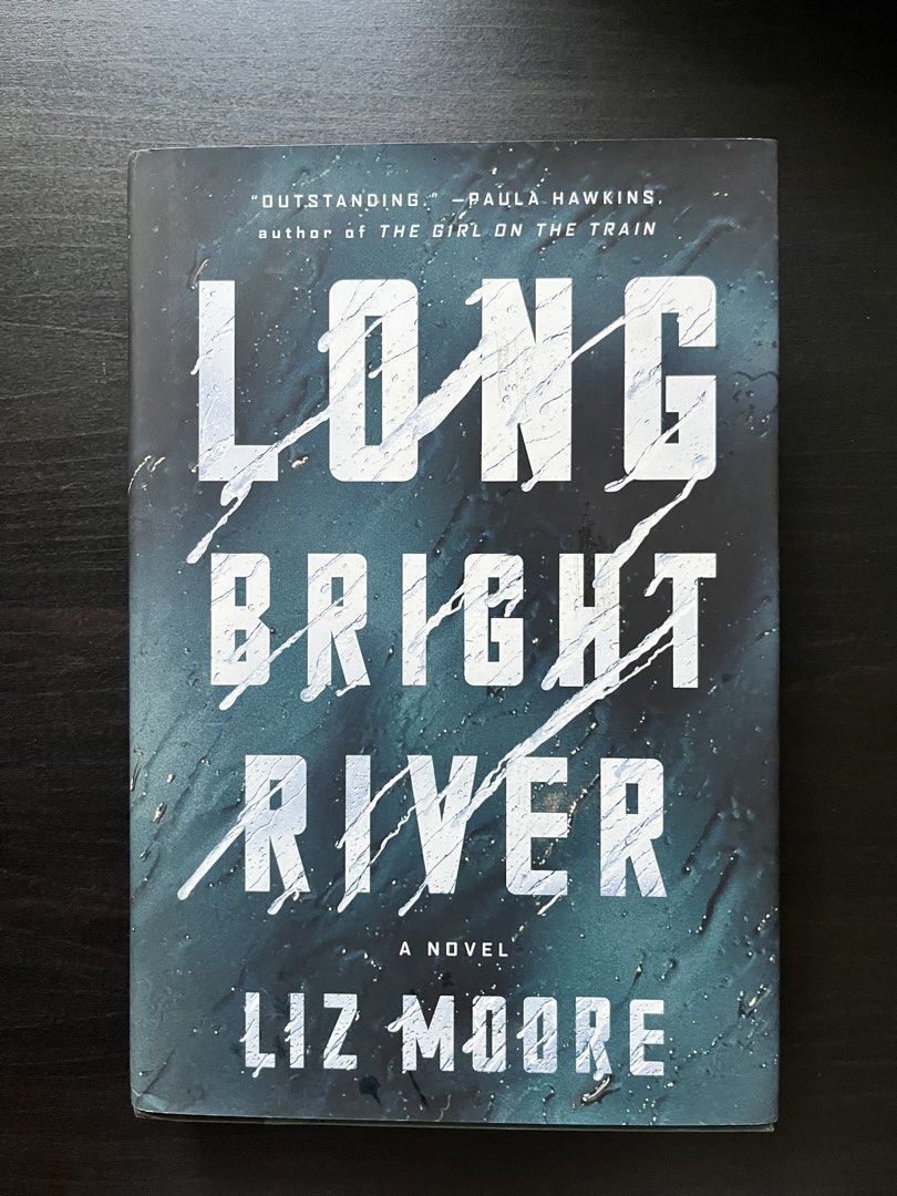 Long Bright River by Liz Moore Novel (Category: Storybooks) located in Manila. Submitted by sunshineapril (Listing ID 1466982422, Image 1). Description: - Title: Long Bright River - Author: Liz Moore - Genre: Thriller / Mystery fiction set in Philadelphia - Publisher: Penguin - Condition: Paperback with clean, white pages; slight shelf wear on edges and corners; price sticker on back cover - Perfect for mystery and thriller fans.
