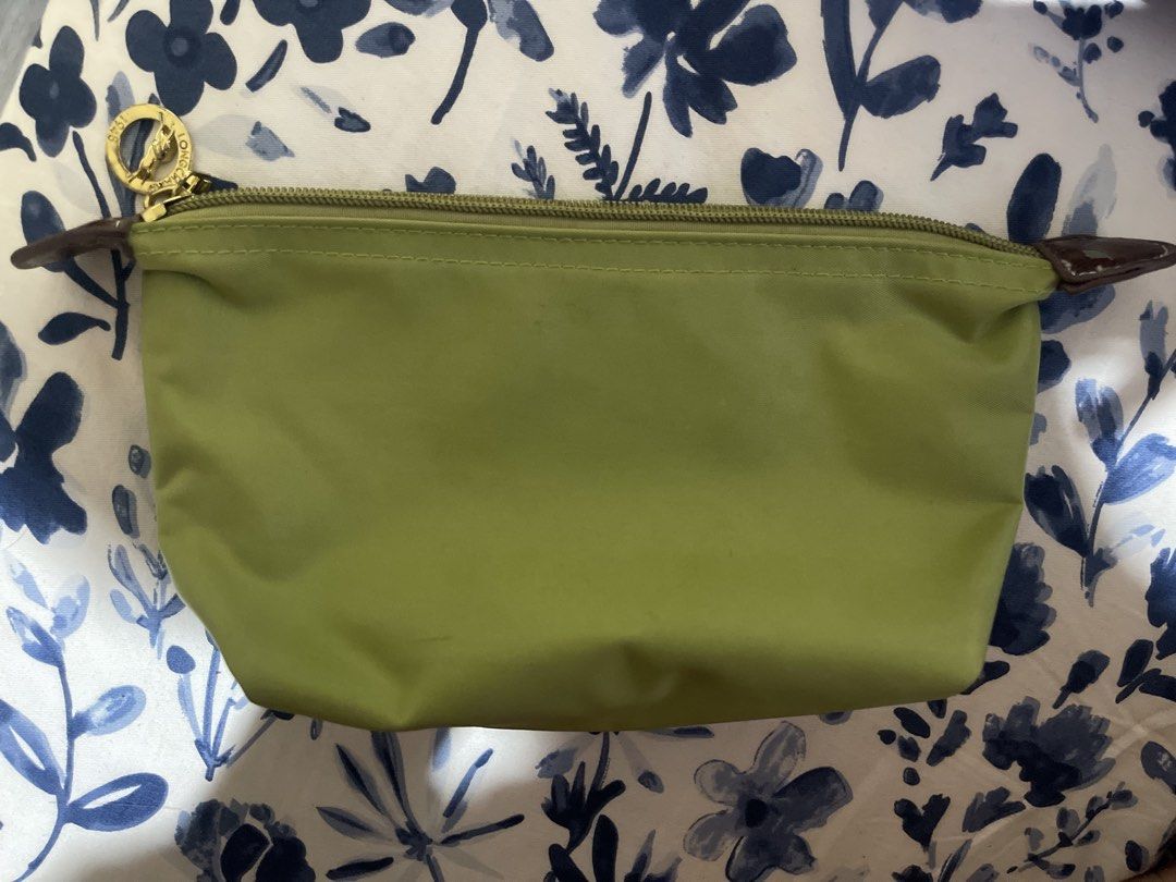 Longchamp Green Cosmetic Pouch (Category: Purses & Pouches) located in Pasig City. Submitted by md24c (Listing ID 1467168184, Image 2). Description: - can't guarantee authenticity - price is negotiable.