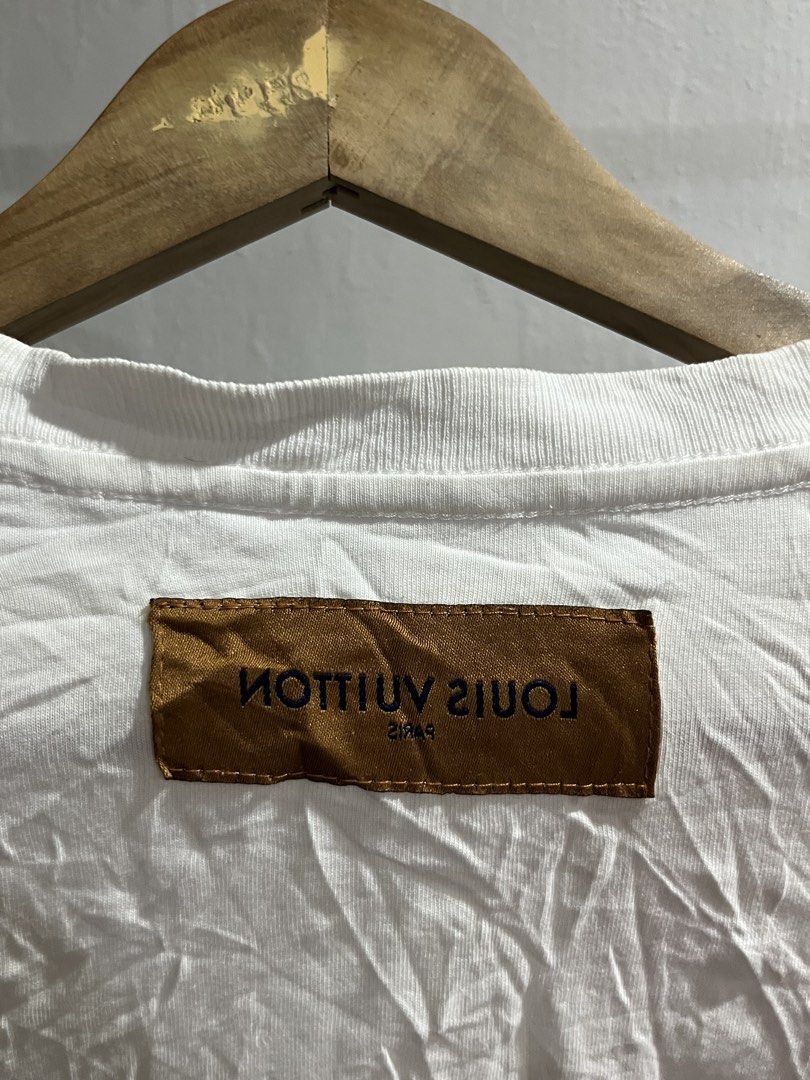 Louis Vuitton (Category: Luxury Apparel) located in Virac. Submitted by _thecave (Listing ID 1467103996, Image 2). Description: Lv Tee Very Good 9.5/10 Color Rate Missing necktag Best fit: M-L Width: 22 Length: 27 .
