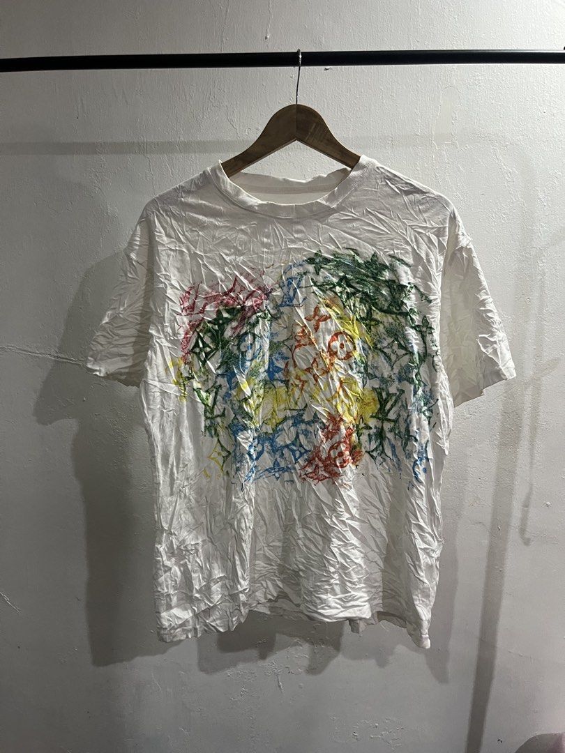Louis Vuitton (Category: Luxury Apparel) located in Virac. Submitted by _thecave (Listing ID 1467103996, Image 1). Description: Lv Tee Very Good 9.5/10 Color Rate Missing necktag Best fit: M-L Width: 22 Length: 27 .