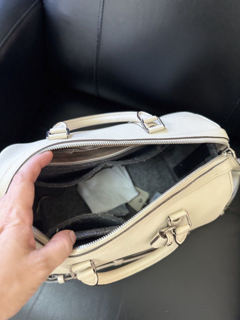 Louis Vuitton Bag (Category: Luxury Bags & Wallets) located in Dipolog. Submitted by skylab79 (Listing ID 1466997678, Image 2). Description: Selling my beautiful Louis Vuitton Sofia Coppola PM in White/Cream color and silver hardware— an elegant and sophisticated bag that adds a touch of understated luxury to any outfit. Its classic silhouette and beautiful neutral shade make it perfect for both casual outings and special occasions. Condition: Ve