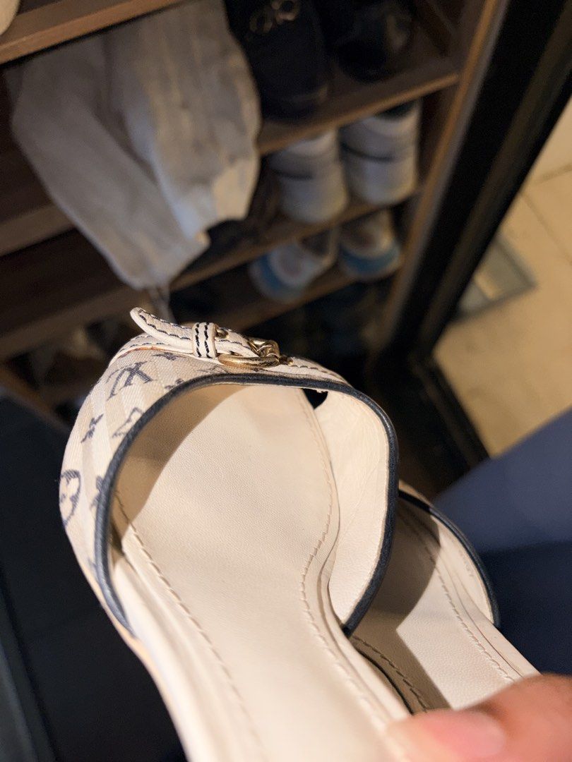 Louis Vuitton Mini Lin Kitten Heels (Category: Heels) located in Calamba. Submitted by rae_preloves (Listing ID 1466977036, Image 3). Description: - Authentic Louis Vuitton open-toe sandals - Beige monogram canvas with cream leather straps - Chic gold-tone buckle hardware - Low heel slip-on style for easy wear - Condition: Shows visible signs of wear, it has a lot of flaws na so for personal use nalang talaga sya - Negotiable - Size 35 1/2 - ship
