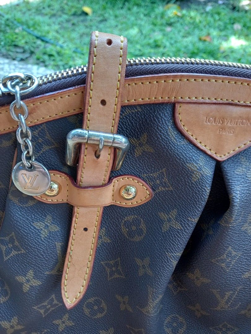 Louis Vuitton Monogram Canvas Handbag (Category: Luxury Bags & Wallets) located in Davao. Submitted by kirk214red-50020 (Listing ID 1466983065, Image 3). Description: - Classic Louis Vuitton monogram canvas with brown leather trim - Dual top handles and stylish front buckle strap details - Secure top zip closure with gold-tone hardware - Roomy brown fabric-lined interior featuring multiple slip pockets - Features Louis Vuitton Paris heat stamp ne