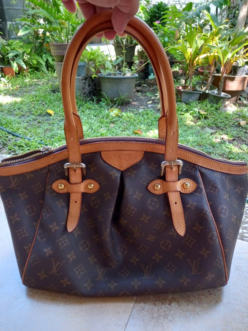 Louis Vuitton Monogram Canvas Handbag (Category: Luxury Bags & Wallets) located in Davao. Submitted by kirk214red-50020 (Listing ID 1466983065, Image 1). Description: - Classic Louis Vuitton monogram canvas with brown leather trim - Dual top handles and stylish front buckle strap details - Secure top zip closure with gold-tone hardware - Roomy brown fabric-lined interior featuring multiple slip pockets - Features Louis Vuitton Paris heat stamp ne