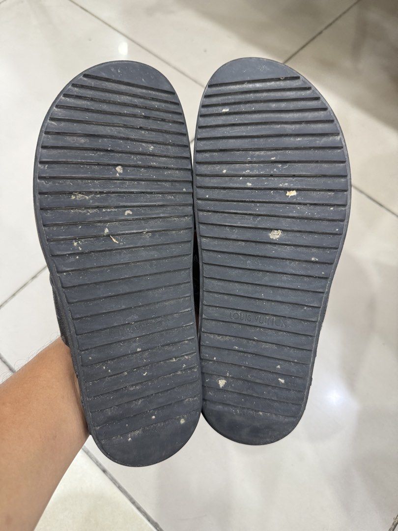Louis Vuitton Monogram Flip Flops Size 42 (Category: Sneakers & Footwear) located in Bacolod City. Submitted by kitcarsonduff (Listing ID 1466995304, Image 3). Description: - Brand: Louis Vuitton - Style: Casual slip-on flip flops - Color: Black with iconic monogram strap design - Size: 42 (indicated on inner strap) - Soles: Rubber ribbed outsoles with LV branding for grip - Condition: Normal signs of use on soles and footbeds, still very wearabl