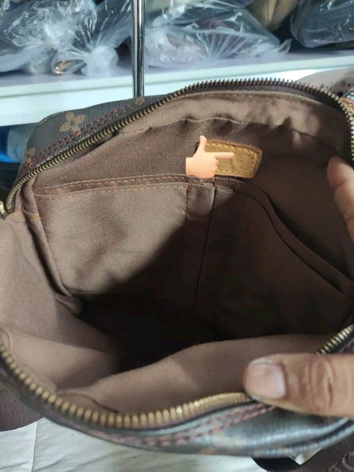 Louis Vuitton Monogram Messenger Bag (Category: Luxury Bags & Wallets) located in Manila. Submitted by bright.mayess (Listing ID 1467058707, Image 2). Description: - Classic brown monogram canvas exterior with dark brown strap - Secure top zipper closure and handy exterior front pocket - Fabric-lined interior equipped with multiple slip pockets - Adjustable shoulder strap featuring embossed logo branding - Elegant gold-tone hardware details - Not