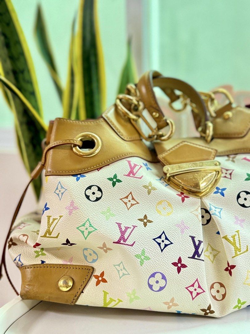 Louis Vuitton Multicolor Monogram (Category: Luxury Bags & Wallets) located in Taytay. Submitted by thekikaymachine (Listing ID 1467136998, Image 2). Description: - Brand: Louis Vuitton - Model: Ursula Shoulder Bag - Design: White Multicolor Monogram canvas, LV Limited edition - Material: Coated canvas and Vachetta leather trim - Hardware: Polished gold-tone with engraved LV Paris closure - Condition: Good pre-owned condition as pictured, vanchet