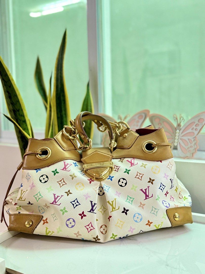 Louis Vuitton Multicolor Monogram (Category: Luxury Bags & Wallets) located in Taytay. Submitted by thekikaymachine (Listing ID 1467136998, Image 1). Description: - Brand: Louis Vuitton - Model: Ursula Shoulder Bag - Design: White Multicolor Monogram canvas, LV Limited edition - Material: Coated canvas and Vachetta leather trim - Hardware: Polished gold-tone with engraved LV Paris closure - Condition: Good pre-owned condition as pictured, vanchet