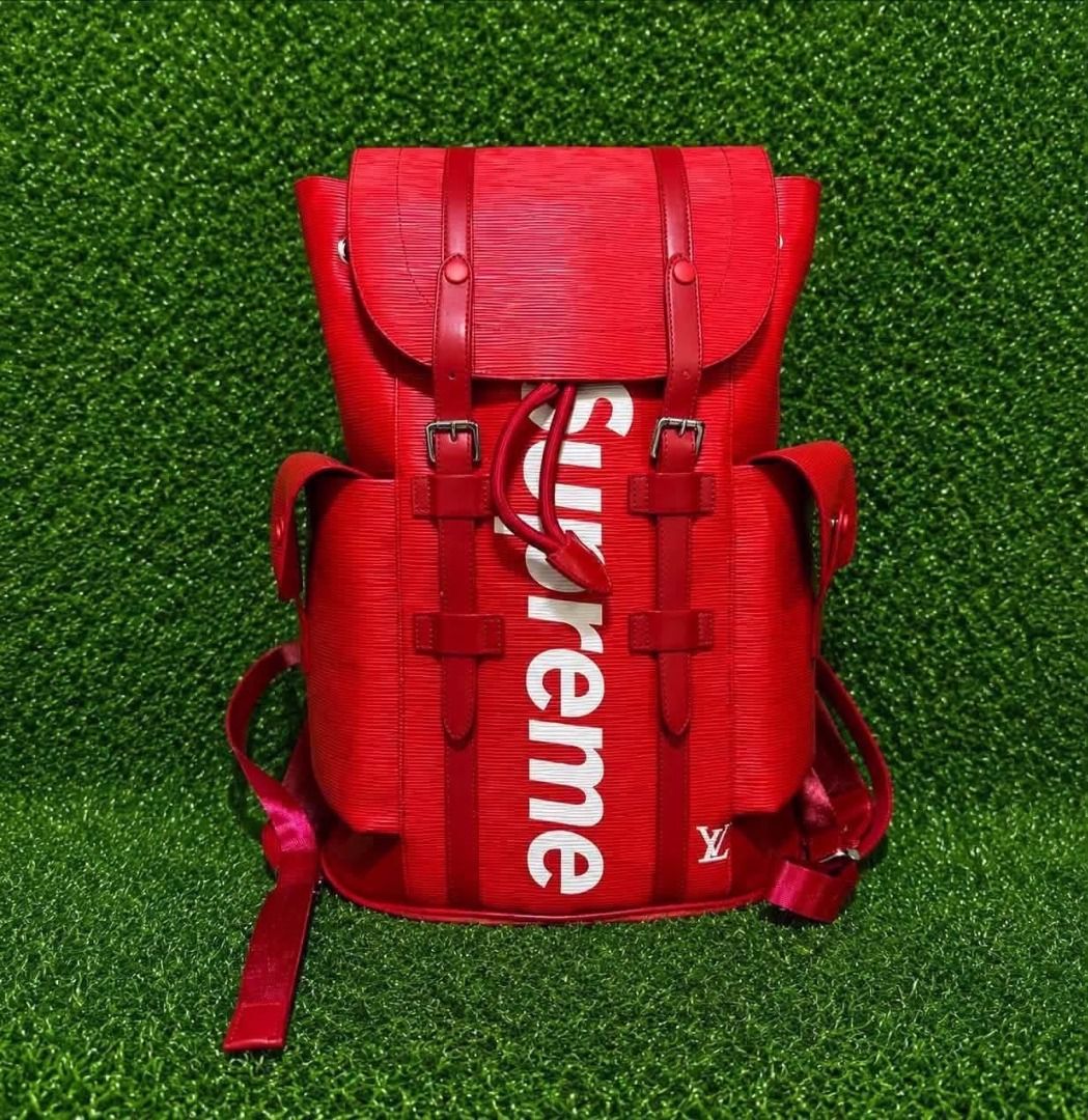 Louis Vuitton x Supreme Christopher PM Backpack – Red Epi Leather (Category: Backpacks) located in Silang. Submitted by ws.thrift (Listing ID 1467060723, Image 1). Description: Specifications & DetailsBrand: Louis Vuitton x Supreme (2017 Collaboration) Model: Christopher Backpack PM Model / Style Code: M53414Color: Supreme Red / White Logo Material: Durable Epi Leather with cowhide trim Hardware: Silver-tone metal hardwareClosure: Flap with dual 