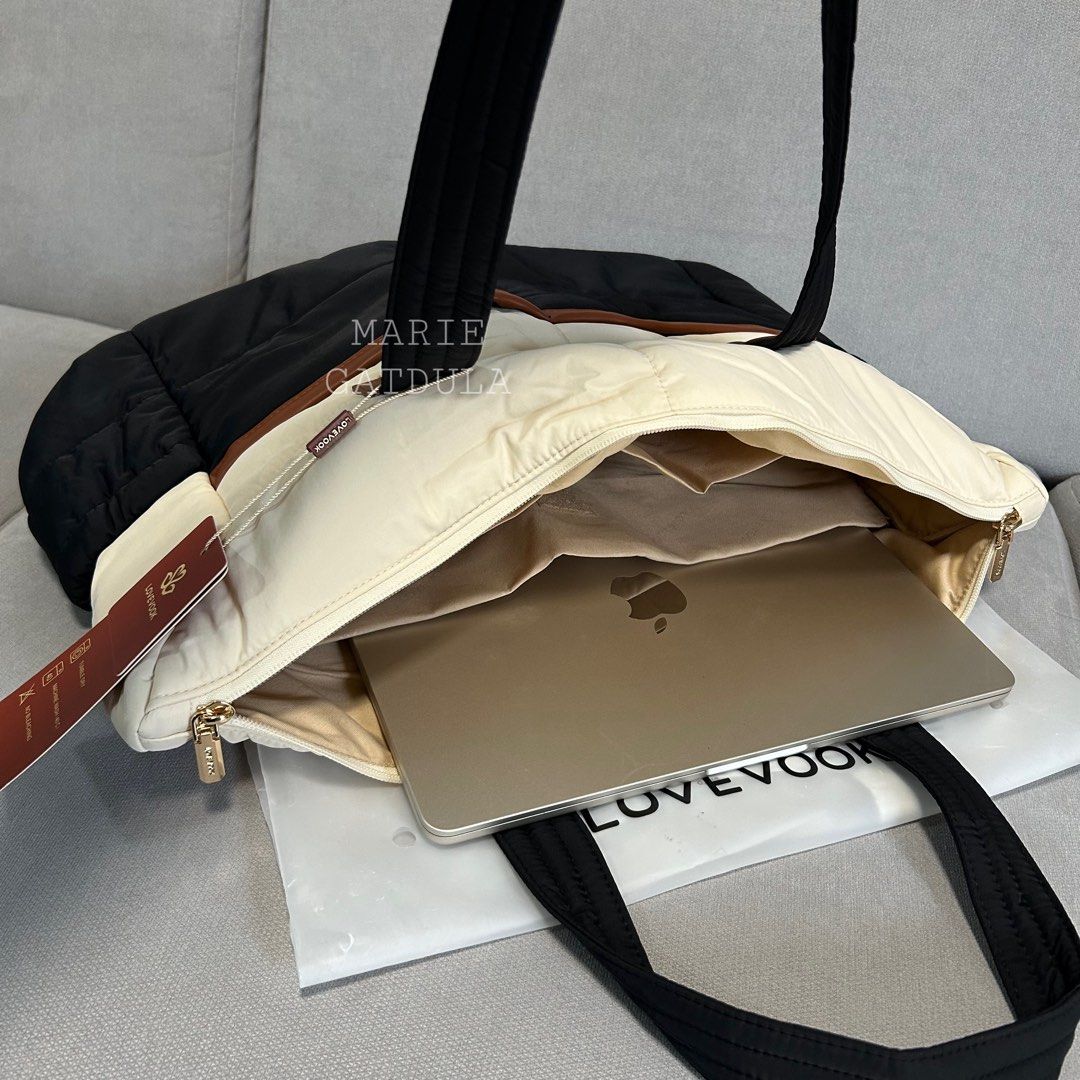 LOVEVOOK Puffer Tote Bag from US 🇺🇸 (Category: Tote Bags) located in Alaminos. Submitted by mariegatdula (Listing ID 1466973539, Image 3). Description: orig price is ₱3200 ($49.99) From US 🇺🇸 Laptop Bag / Mommy Bag Fits a 15 inch laptop 💻 BRAND NEW with Tags 🏷️ PWEDE SA MALETA. Kung hindi gagamitin sa maleta, pwede syang pocket. May zipper sa ilalim para ma-close..