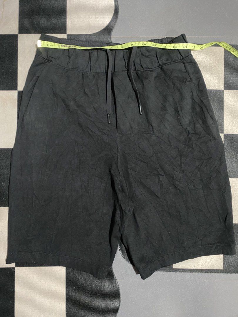 Lululemon Black Shorts Size M (Category: Activewear) located in Las Pinas. Submitted by matilliano76499 (Listing ID 1467143640, Image 1). Description: - Brand: Lululemon - Color: Black - Size: Medium (M) - Waistband: Elastic with adjustable drawstring and branded metallic tips - Pockets: Two functional front pockets - Details: Subtle logo stamp on the lower leg - Versatility: Perfect for everyday workouts or casual lounging.