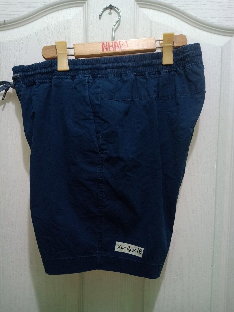 Lululemon short (Category: Shorts) located in Cavite. Submitted by nigo1993 (Listing ID 1467091247, Image 1). Description: - Color: Navy blue - Size: XL - Waistband: Elastic with adjustable drawstring - Pockets: Handy built-in side pockets - Fit: Straight hem, finishes above the knee - Material: Light and comfortable for warm weather - Condition: Clean fabric all around.
