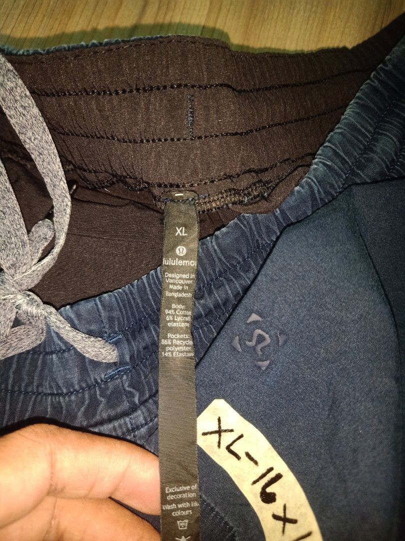 Lululemon short (Category: Shorts) located in Cavite. Submitted by nigo1993 (Listing ID 1467091247, Image 3). Description: - Color: Navy blue - Size: XL - Waistband: Elastic with adjustable drawstring - Pockets: Handy built-in side pockets - Fit: Straight hem, finishes above the knee - Material: Light and comfortable for warm weather - Condition: Clean fabric all around.