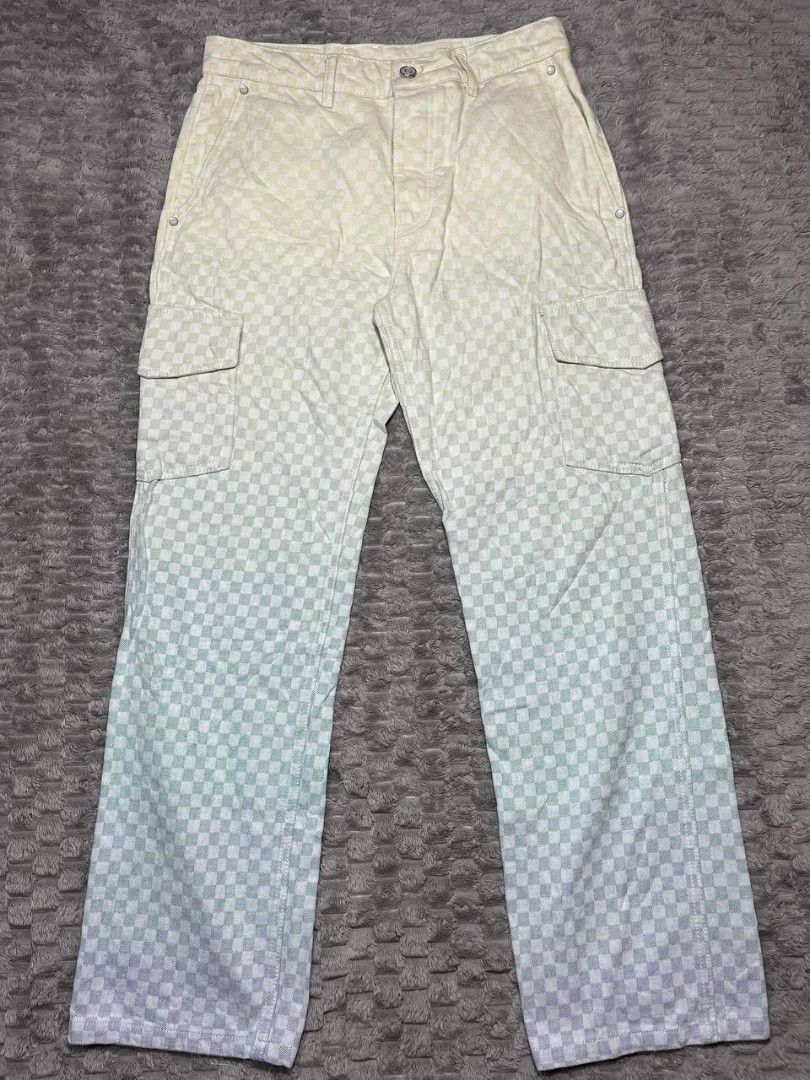 LV monogram multicolor cargo pants (Category: Jeans) located in Cagayan de Oro. Submitted by smoothstyle (Listing ID 1467127890, Image 2). Description: LV monogram multicolor cargo pants Excellent condition 9.5/10 color rate Waistline: 30-32 length: 40 leg opening: 8 no issue.