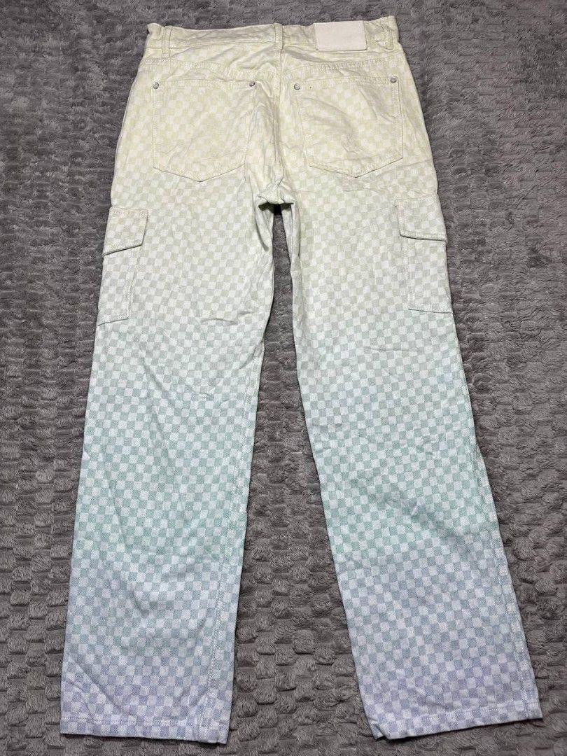 LV monogram multicolor cargo pants (Category: Jeans) located in Cagayan de Oro. Submitted by smoothstyle (Listing ID 1467127890, Image 1). Description: LV monogram multicolor cargo pants Excellent condition 9.5/10 color rate Waistline: 30-32 length: 40 leg opening: 8 no issue.