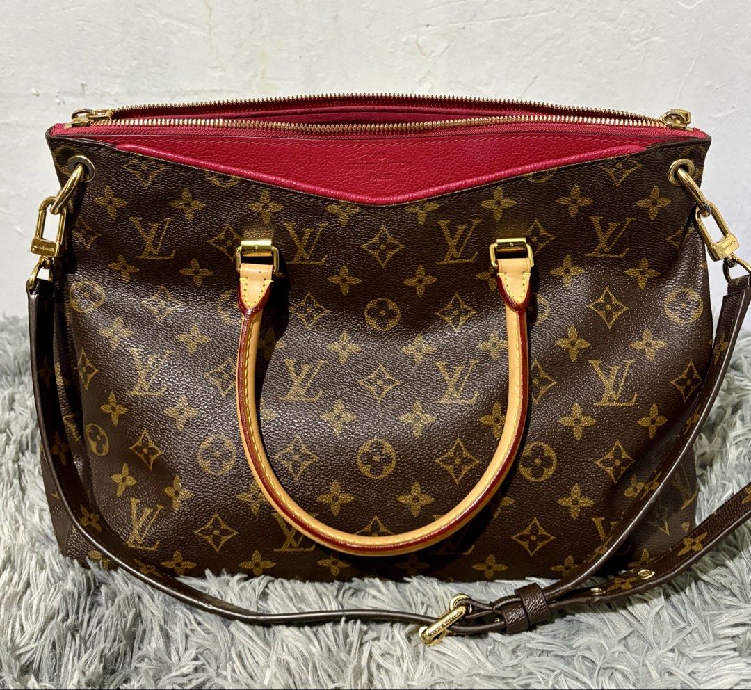 LV Pallas (Category: Luxury Bags & Wallets) located in Manila. Submitted by jlj_v.2_oshop (Listing ID 1467020831, Image 1). Description: LV Monogram Pallas MM satchel featuring the signature brown monogram canvas, natural cowhide leather handles, a detachable shoulder strap, and bright pink or red calfskin trim. Medium size. These preloved bags and shoes are sourced from Japan, Korea, and Thailand through a seller friend. They are well-loved item
