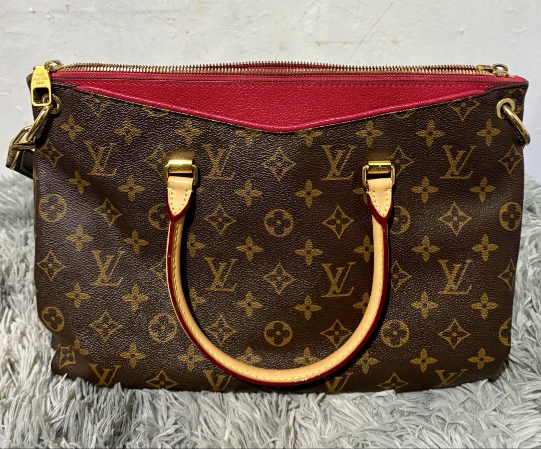 LV Pallas (Category: Luxury Bags & Wallets) located in Manila. Submitted by jlj_v.2_oshop (Listing ID 1467020831, Image 2). Description: LV Monogram Pallas MM satchel featuring the signature brown monogram canvas, natural cowhide leather handles, a detachable shoulder strap, and bright pink or red calfskin trim. Medium size. These preloved bags and shoes are sourced from Japan, Korea, and Thailand through a seller friend. They are well-loved item