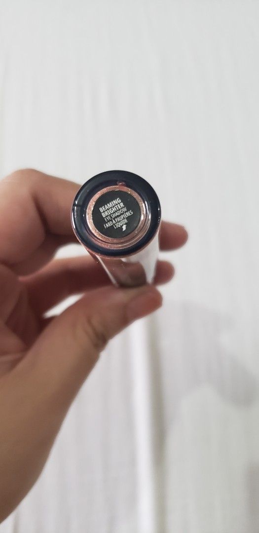 MAC Dazzleshadow Liquid - Beaming Brighter (Category: Makeup) located in Makati City. Submitted by doughrise28 (Listing ID 1467062347, Image 2). Description: - Authentic MAC Dazzleshadow Liquid eyeshadow - Shade: Beaming Brighter (Shimmery bronze) - Long-wearing sparkle finish - Easy application with built-in wand - Standard full-size tube.