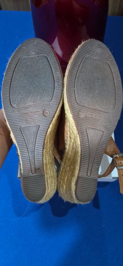Macarena Leather Wedge Espadrilles Size 38 (Category: Wedges) located in Manila. Submitted by pixiedachi (Listing ID 1467032866, Image 3). Description: - Brand: Macarena - Style: Tan leather wedge espadrilles with peep toe and slingback strap - Size: 38 (Made in Spain) - Details: Silver buckle closure, woven jute wedge heel, and gold stamped branding on clean footbeds - Condition: Minor scuffs on leather and gentle wear on soles 3 inches heel Hei