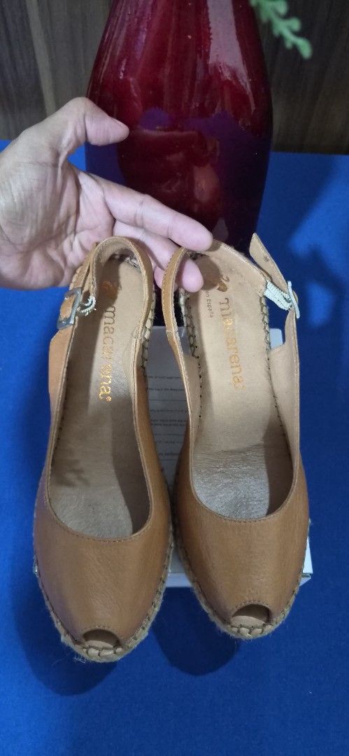 Macarena Leather Wedge Espadrilles Size 38 (Category: Wedges) located in Manila. Submitted by pixiedachi (Listing ID 1467032866, Image 1). Description: - Brand: Macarena - Style: Tan leather wedge espadrilles with peep toe and slingback strap - Size: 38 (Made in Spain) - Details: Silver buckle closure, woven jute wedge heel, and gold stamped branding on clean footbeds - Condition: Minor scuffs on leather and gentle wear on soles 3 inches heel Hei