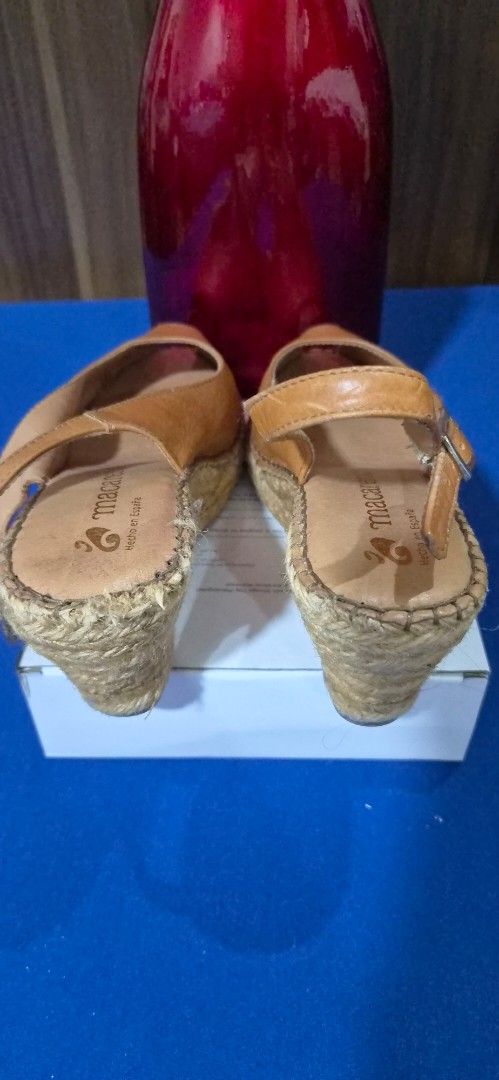 Macarena Leather Wedge Espadrilles Size 38 (Category: Wedges) located in Manila. Submitted by pixiedachi (Listing ID 1467032866, Image 2). Description: - Brand: Macarena - Style: Tan leather wedge espadrilles with peep toe and slingback strap - Size: 38 (Made in Spain) - Details: Silver buckle closure, woven jute wedge heel, and gold stamped branding on clean footbeds - Condition: Minor scuffs on leather and gentle wear on soles 3 inches heel Hei