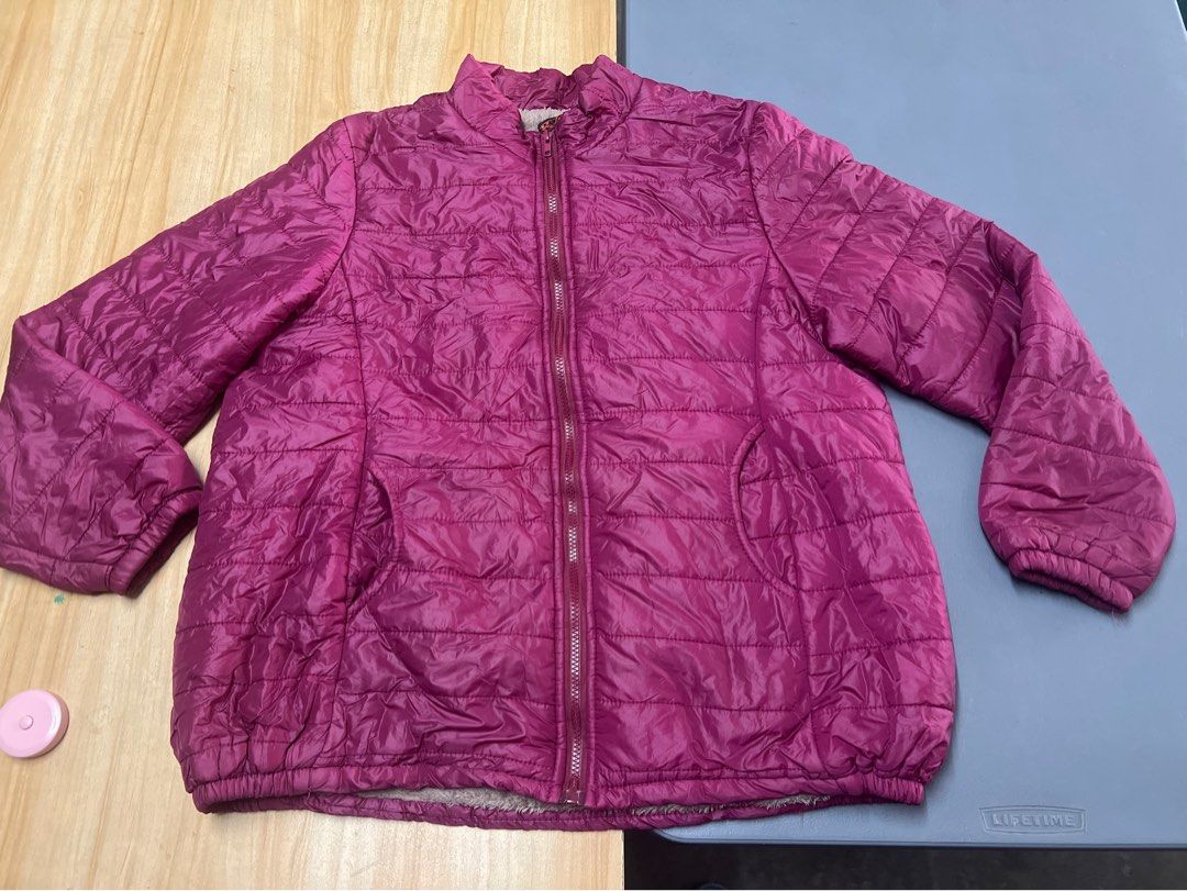 Magenta Puffer Jacket with Faux Fur Lining (Category: Coats, Jackets and Outerwear) located in Bulacan. Submitted by Domozz (Listing ID 1467050464, Image 1). Description: - Color: Bright magenta - Design: Quilted puffer jacket with soft grey faux fur lining - Features: Full zip front closure and practical side pockets - Comfort: Elastic cuffs and hem to lock in heat - Condition: Great piece for cold weather travels or chilly days XL to XXL PINK .