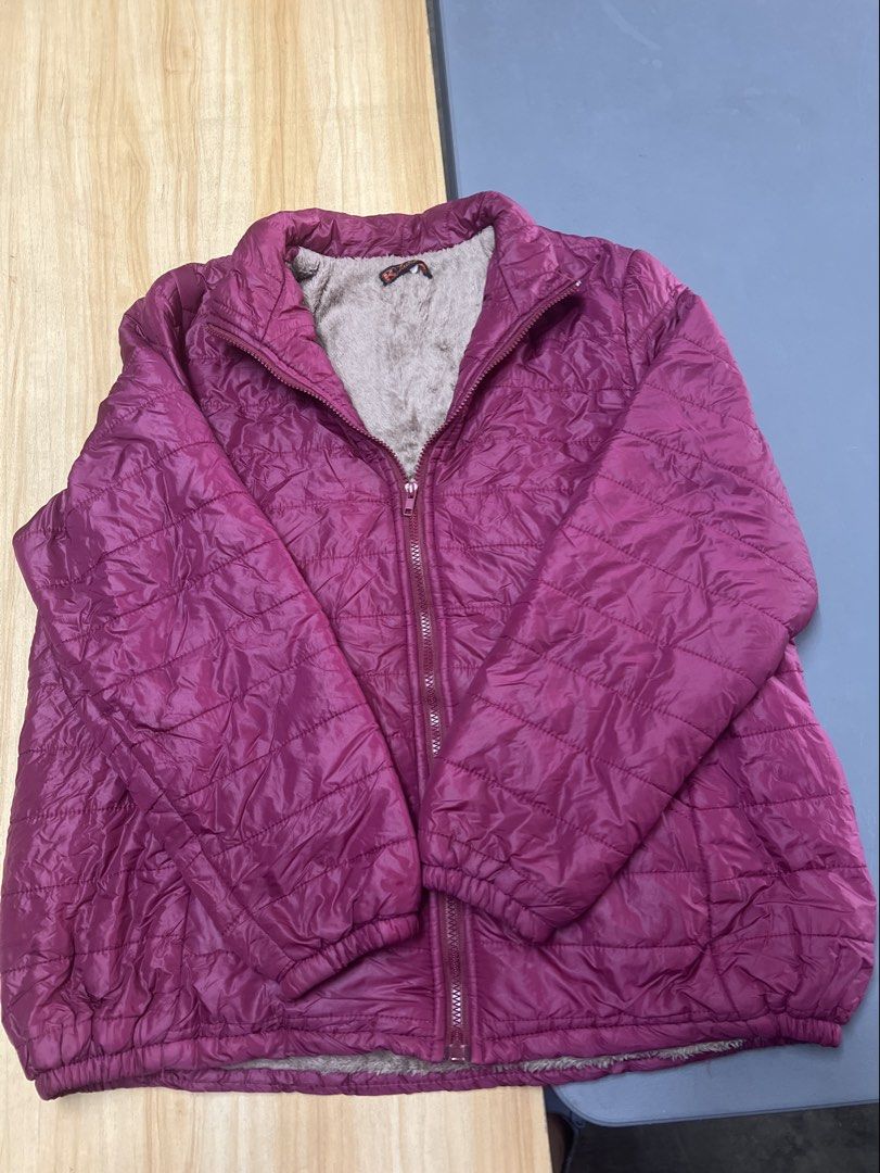 Magenta Puffer Jacket with Faux Fur Lining (Category: Coats, Jackets and Outerwear) located in Bulacan. Submitted by Domozz (Listing ID 1467050464, Image 2). Description: - Color: Bright magenta - Design: Quilted puffer jacket with soft grey faux fur lining - Features: Full zip front closure and practical side pockets - Comfort: Elastic cuffs and hem to lock in heat - Condition: Great piece for cold weather travels or chilly days XL to XXL PINK .