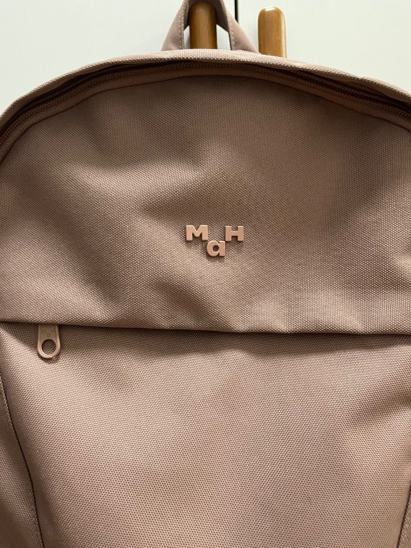 MAH Backpack (Category: Backpacks) located in Manila. Submitted by romille12345 (Listing ID 1467116835, Image 2). Description: MAH Backpack Fits 13inches laptop. Color Gray Rose Still clean inside..