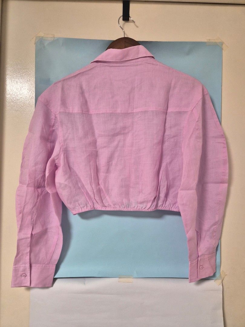 Maje Pink Long Sleeve Cropped Button Up Blouse Size 2 (Category: Longsleeves) located in Manila. Submitted by prelovedbyc.hannah (Listing ID 1467081074, Image 2). Description: - Brand: Maje - Size: 2 - Style: Cropped shirt with classic collar and front button closure - Sleeves: Long sleeves with button cuffs - Condition: Excellent / Like new.