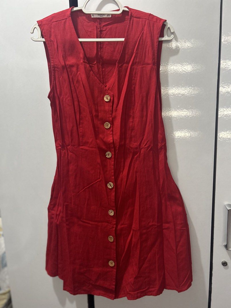 Mango Button-Down Linen Mini Dress in Crimson Red (Category: Dresses) located in Pasig City. Submitted by ladyleslieisletavelarde4902 (Listing ID 1467083087, Image 1). Description: A vibrant, chic sleeveless mini dress crafted in breathable linen fabric, complete with a flattering V-neck and wooden button-front detail. Brand: Mango (MANGO Casual) Tag Size: EUR S / USA 4 Recommended Fit: Fits Small Color: Vibrant Crimson / Ruby Red Features: Sleev