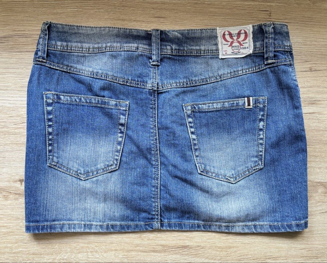 Mango Jeans Denim Mini Skirt Size USA 2 (Category: Skirts) located in Paranaque City. Submitted by ggg.bin (Listing ID 1466975896, Image 2). Description: - Brand: Mango - Style: Denim mini skirt in mid blue wash - Size: EUR 34 / USA 2 / MEX 1 (fits extra small to small) - Details: Button-up front with metal buttons, front coin pocket, and two back pockets - Condition: Excellent, versatile everyday piece for warmer weather - Mode of Payment: GCash