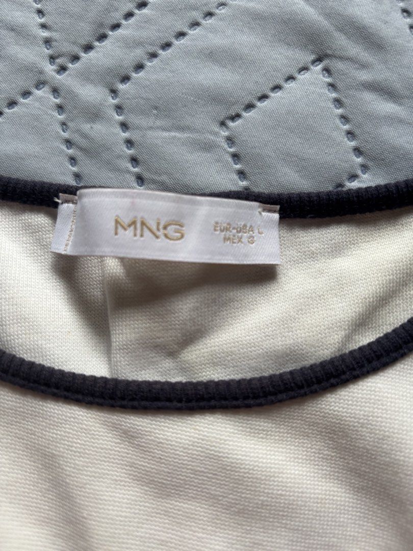 Mango white crop top (Category: Blouses) located in Calamba. Submitted by rache31 (Listing ID 1466998243, Image 2). Description: Mango white crop top Blue lining at the sleeves at neck line.