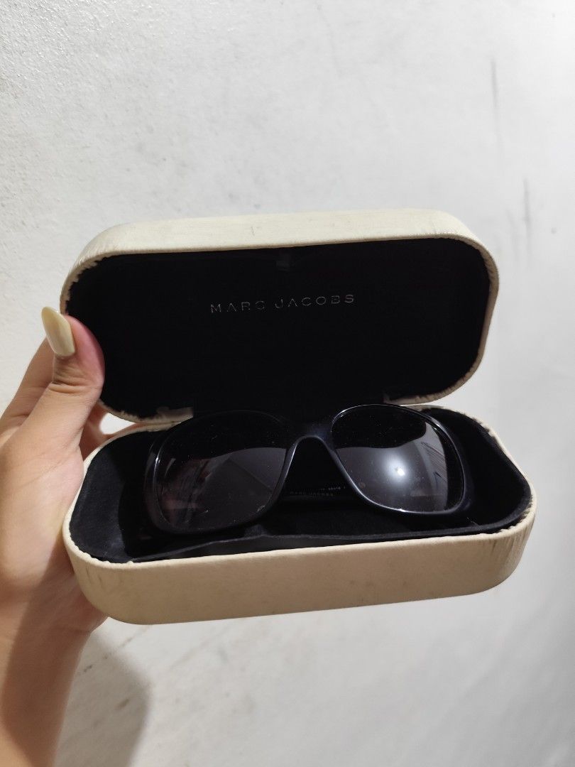 Marc by Marc Jacobs Black Sunglasses with Case (Category: Sunglasses & Eyewear) located in Cavite. Submitted by zenshub (Listing ID 1467083810, Image 1). Description: Di masyado nagamit ng parents, natambak na po. Bought in Dubai..