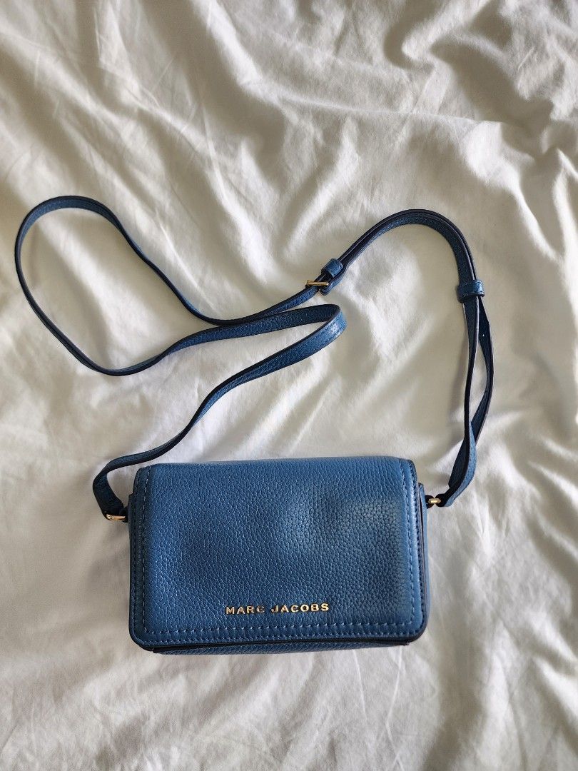 Marc Jacobs Mini Crossbody Bag (Category: Cross-body Bags) located in Taguig. Submitted by groovefunknsoul (Listing ID 1467051817, Image 1). Description: - Marc Jacobs Leather mini crossbody bag - Magnetic closure - Adjustable straps - Used less than 5x, no scratches or stains.