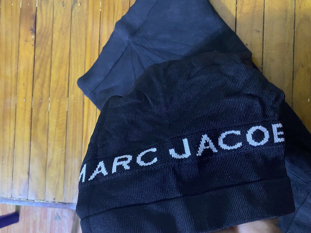 Marc Jacobs The Bike Short Black Size XS (Category: Shorts) located in San Jose del Monte. Submitted by dripfromthrift2 (Listing ID 1467060921, Image 2). Description: - Brand: Marc Jacobs - Item: The Bike Short - Color: Black - Size: XS (155/68AXS) - Material: 64% viscose, 33% nylon, 3% elastane - Features: Ribbed knit fabric with contrast white Marc Jacobs logo text near the hem - Origin: Made in Turkey - Care Instructions: Hand wash cold only.