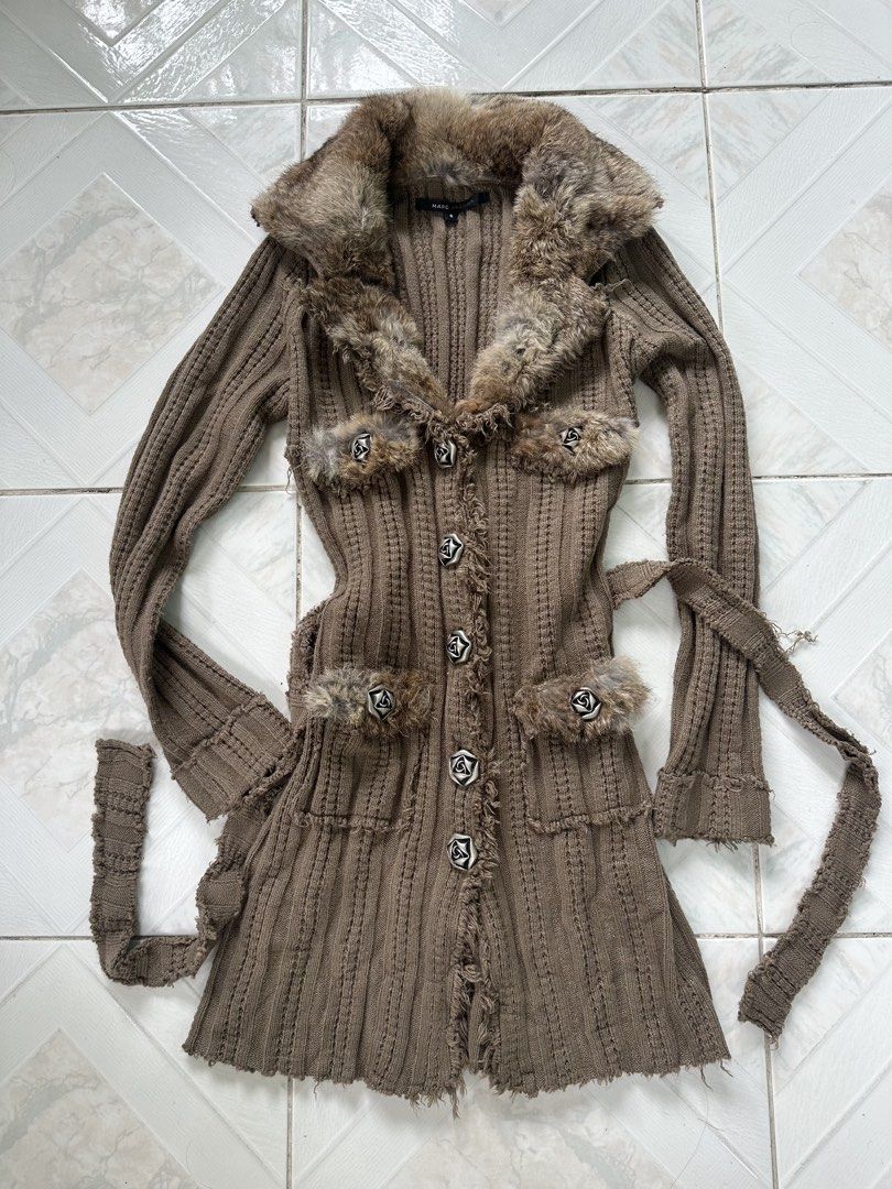 Marc Jacobs y2k 2000s era (Category: Coats, Jackets and Outerwear) located in Manila. Submitted by kupal24 (Listing ID 1467006560, Image 1). Description: Marc Jacobs long cardigan in taupe brown. Made of 70% wool and 30% cotton. Thick ribbed knit material with distressed raw hems and edges. Oversized furry collar and matching fur trim on front pocket flaps. Distinctive flower-shaped silver buttons down the front. Includes a tie belt in the same k