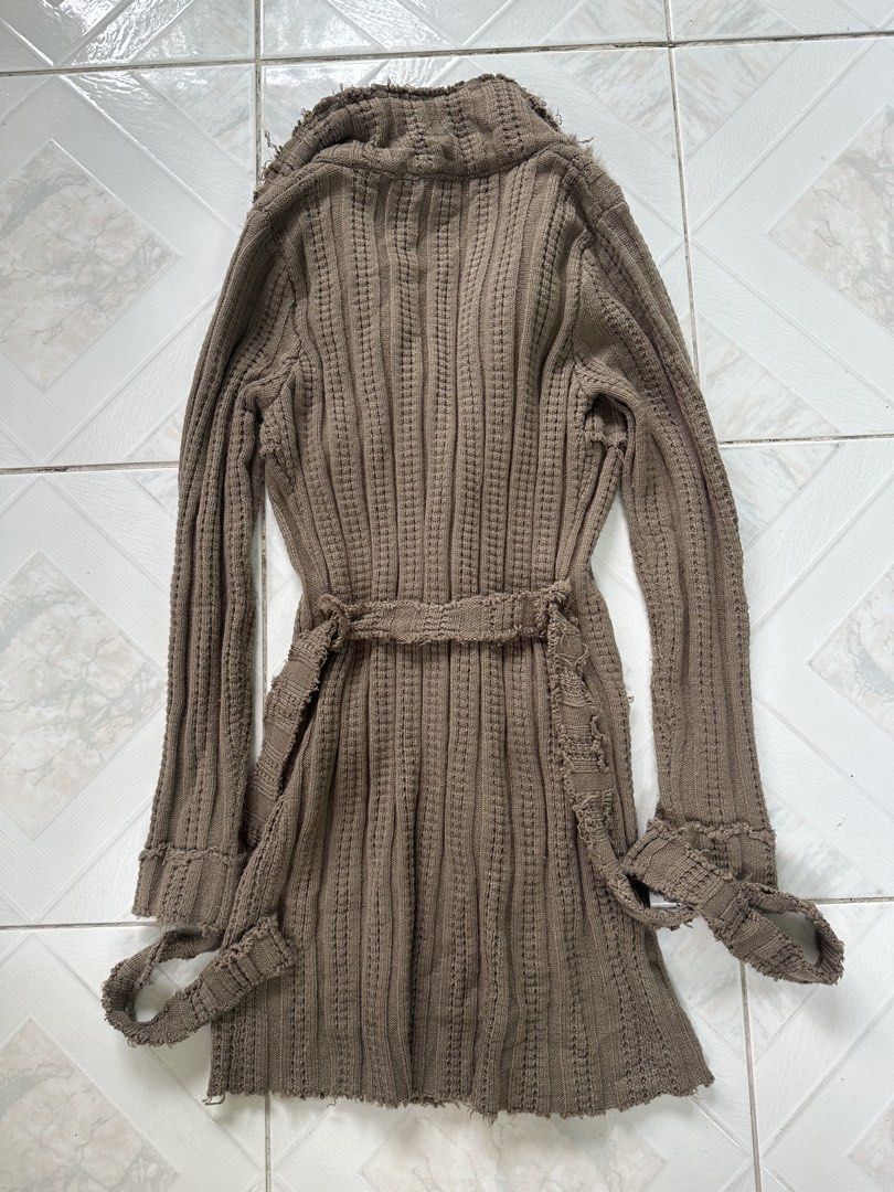 Marc Jacobs y2k 2000s era (Category: Coats, Jackets and Outerwear) located in Manila. Submitted by kupal24 (Listing ID 1467006560, Image 2). Description: Marc Jacobs long cardigan in taupe brown. Made of 70% wool and 30% cotton. Thick ribbed knit material with distressed raw hems and edges. Oversized furry collar and matching fur trim on front pocket flaps. Distinctive flower-shaped silver buttons down the front. Includes a tie belt in the same k