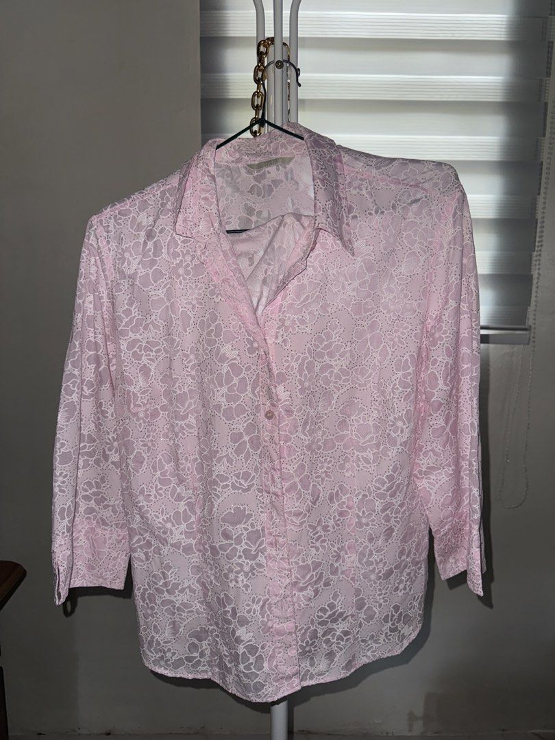 Marks & Spencer Pink Floral Button-Down Blouse UK 16 (Category: Blouses) located in La Trinidad. Submitted by prelovedandfindsbyji (Listing ID 1466981967, Image 1). Description: - Brand: Marks & Spencer - Color: Pale pink with white floral print and tiny metallic silver dots - Size: UK 16 (Made in Malaysia) - Style: Button-down, classic collar, 3/4 sleeves - Material: Lightweight and breathable.
