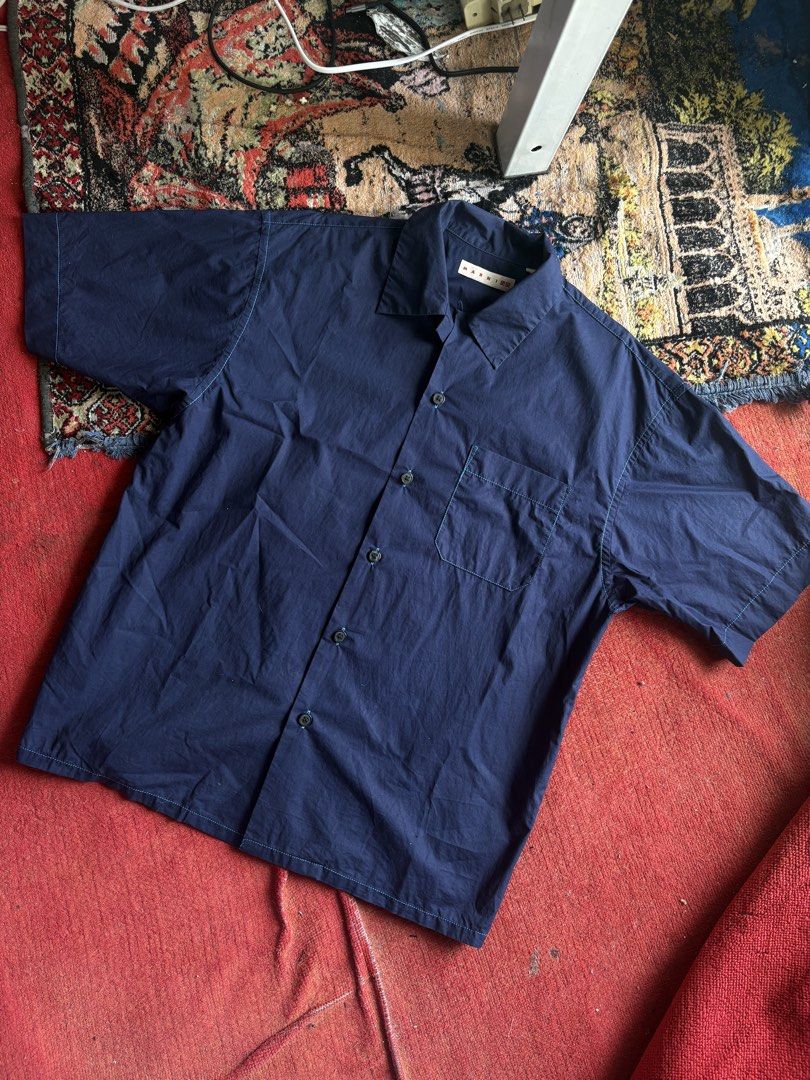 Marni x Uniqlo Polo (Category: Tshirts & Polo Shirts ) located in Pasay City. Submitted by namastenamstenamaste (Listing ID 1466971914, Image 1). Description: Marni x Uniqlo Polo Contrast stitching no issue W:22 L:26 +sf .