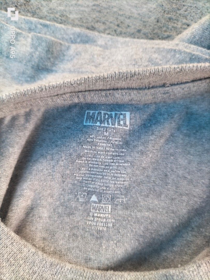Marvel Comics "Escape Impossible!" Vintage-Style Graphic Tee (Category: Tshirts & Polo Shirts ) located in Alabel. Submitted by hera_juno (Listing ID 1467079977, Image 3). Description: Front print featuring classic retro comic book style art with The Hulk, Captain America, Iron Man, Thor, Spider-Man, and Black Widow. Bold "Escape Impossible!" slogan banner..