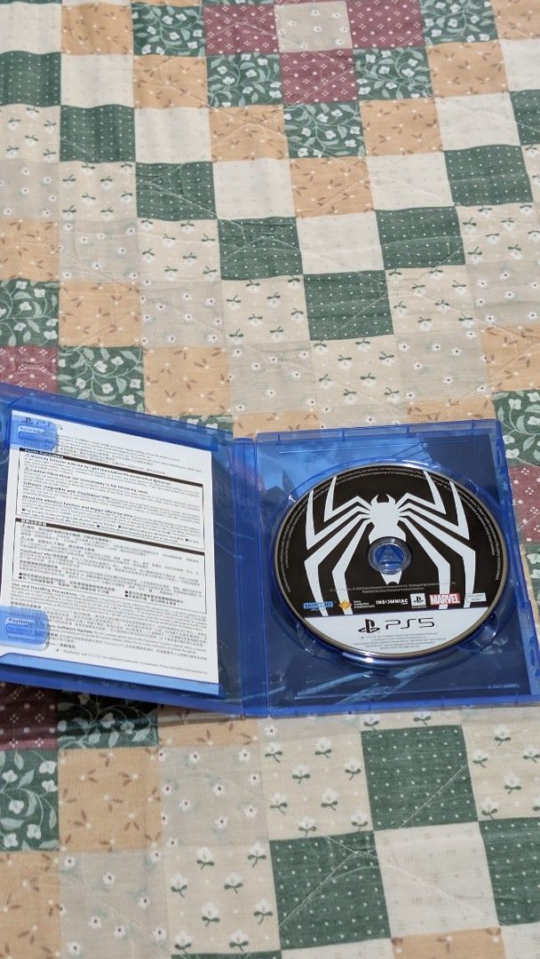 Marvel's Spider-Man 2 PS5 Game (Category: PlayStation) located in Quezon City. Submitted by jbablan (Listing ID 1467047272, Image 2). Description: - Game: Marvel's Spider-Man 2 for PlayStation 5 (Physical Disc) - Condition: Disc is clean, tested, and works perfectly - Includes: Original blue case, cover art, and manual inserts - Gameplay: Action-adventure starring Peter Parker and Miles Morales - Mode: Single-player experience.