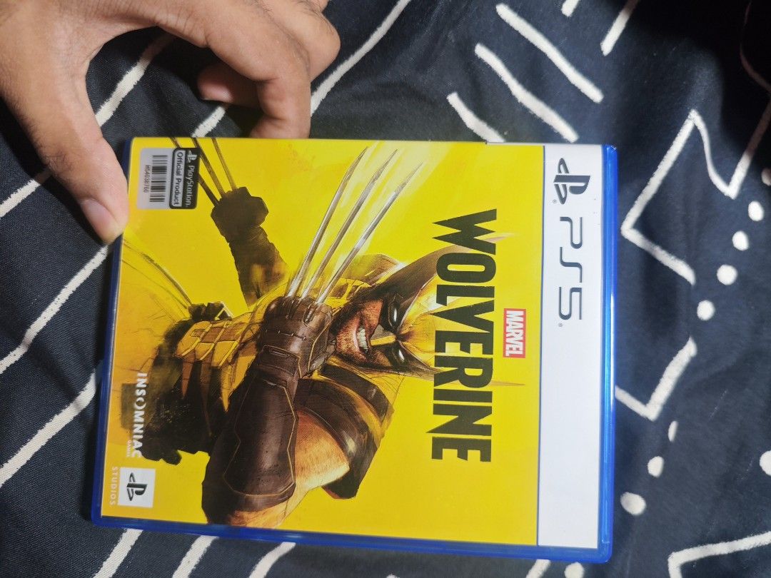 Marvel's Wolverine PS5 Game (Category: PlayStation) located in Manila. Submitted by Irvi13488 (Listing ID 1467074355, Image 1). Description: - Platform: PlayStation 5 (PS5) -Used code - Condition: Like new, physical disc with zero scratches - Inclusion: Original blue case, cover art, and insert leaflets - Status: Ready to play, carefully handled OPEN FOR TRADE.