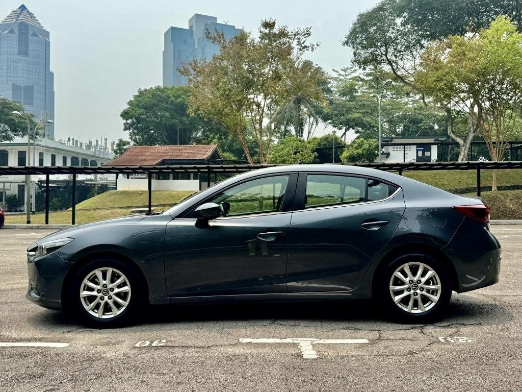 Mazda 3 Sedan 1.5 Standard (A) (Category: Used Cars) located in Singapore. Submitted by m_macztech (Listing ID 1466987335, Image 2). Description: ➡️ Features 1.5L 4-cylinder in-line 16-valve DOHC SkyActiv-G with 6-speed (A) transmission producing 118bhp. Fuel Consumption of 17.5 km/L with 51L Tank capacity ℹ️ Accessories Factory infotainment with Bluetooth, multi function steering wheel, reverse sensor, keyless entry/start, Sunroof ✅ Well taken c