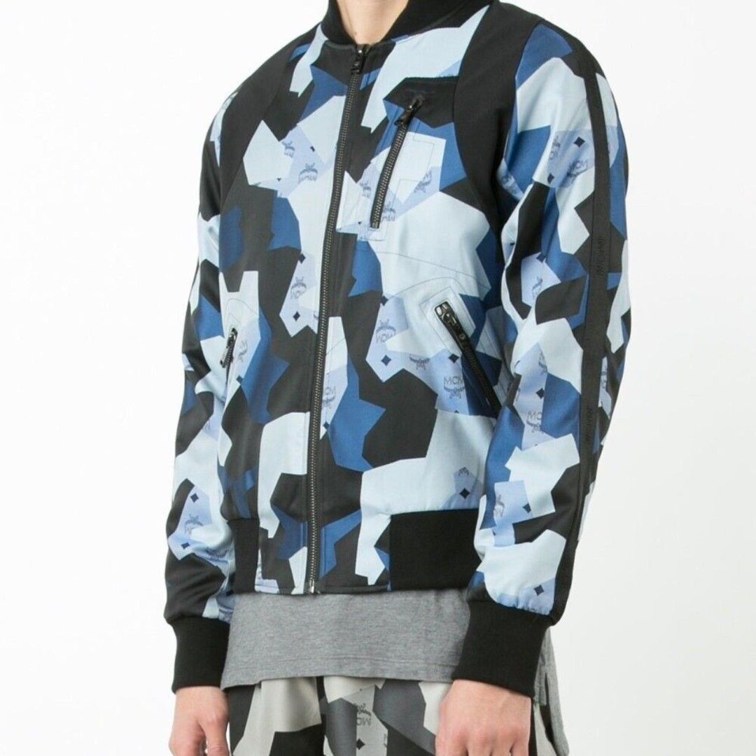 mcm x christopher raeburn bomber jacket (Category: Luxury Apparel) located in Amadeo. Submitted by josephotep (Listing ID 1467166234, Image 1). Description: mcm x christopher raeburn bomber jacket L on tag 22.5x25 minimal sign of usage in hem, neck at sa kamay(9.5/10 colorate condition) sa blue part is excellent 1999 plus sf loc cavite pm📥.