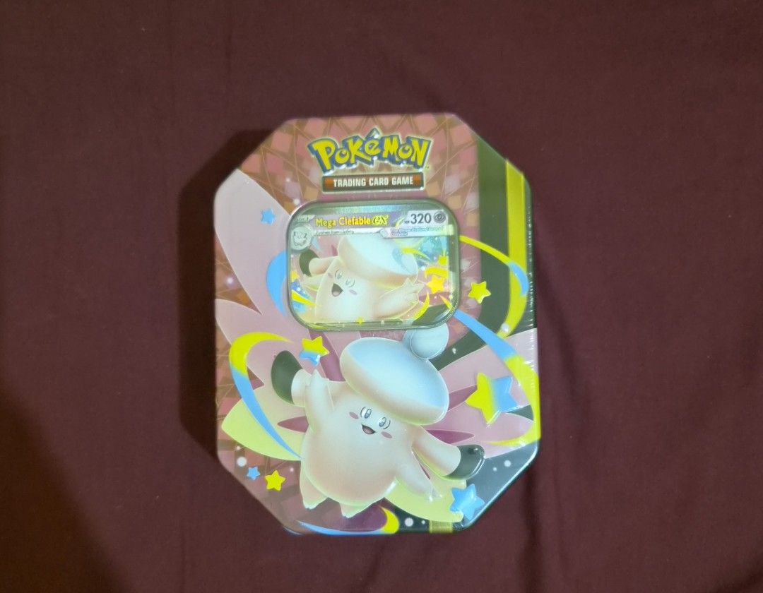 Mega Moonlit Tin (Category: Card Boxes & Cases) located in Manila. Submitted by serkai (Listing ID 1467104066, Image 1). Description: Mega Clefable ex sealed tin includes 4 packs (Chaos Rising/Perfect Order).