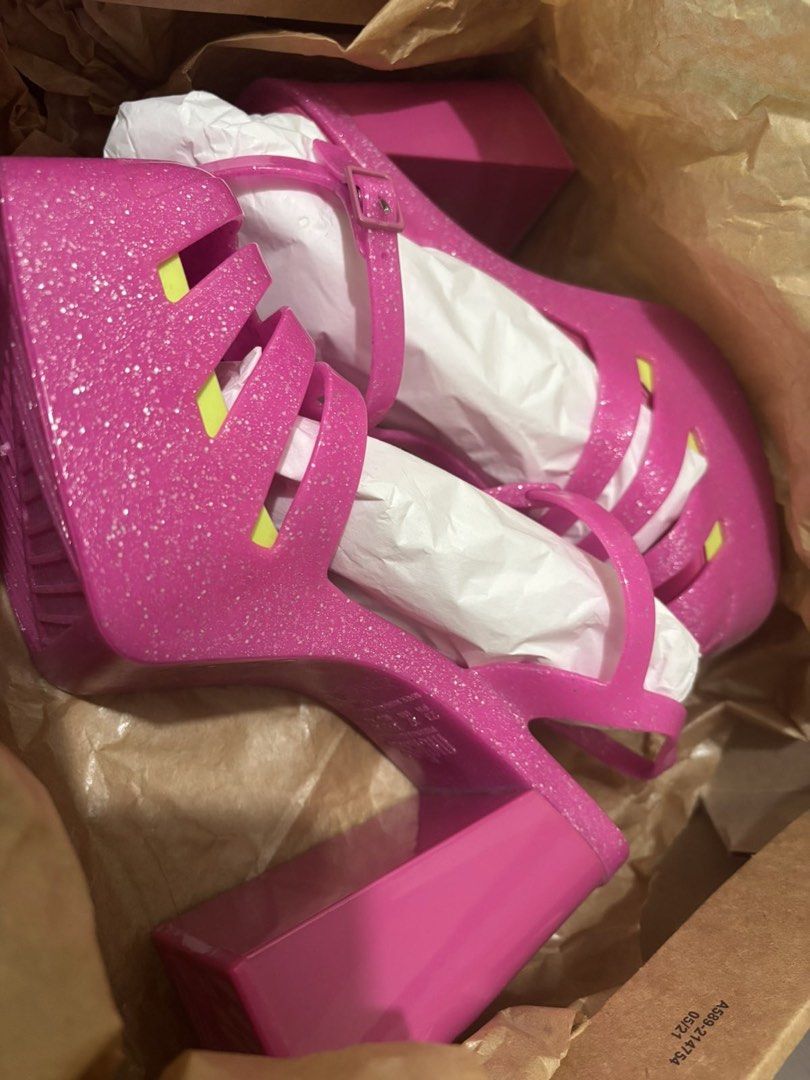 Melissa Pink Glitter (Category: Wedges) located in Makati City. Submitted by melanieala71509 (Listing ID 1467021991, Image 1). Description: Brand New! Melissa Party Heel Glitter in Pink with box Size: US 6 bought in melissa ph - sale Selling Price: 1,750.
