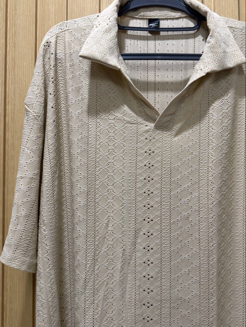 Mens Beach Beige Polo (Category: Tshirts & Polo Shirts ) located in Bacoor. Submitted by preloved_with_love_ (Listing ID 1467157342, Image 2). Description: Dimensions W- 25in L- 30in - Brand: Manfinity - Size: XXL - Color: Beach Beige - Style: Short-sleeve polo shirt with open collar and textured vertical pattern - Material: 93% Polyester, 7% Elastane for comfort and stretch - Condition: Excellent pre-owned condition - Perfect for casual outings,
