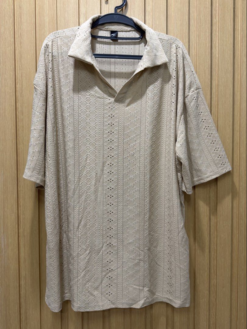 Mens Beach Beige Polo (Category: Tshirts & Polo Shirts ) located in Bacoor. Submitted by preloved_with_love_ (Listing ID 1467157342, Image 1). Description: Dimensions W- 25in L- 30in - Brand: Manfinity - Size: XXL - Color: Beach Beige - Style: Short-sleeve polo shirt with open collar and textured vertical pattern - Material: 93% Polyester, 7% Elastane for comfort and stretch - Condition: Excellent pre-owned condition - Perfect for casual outings,